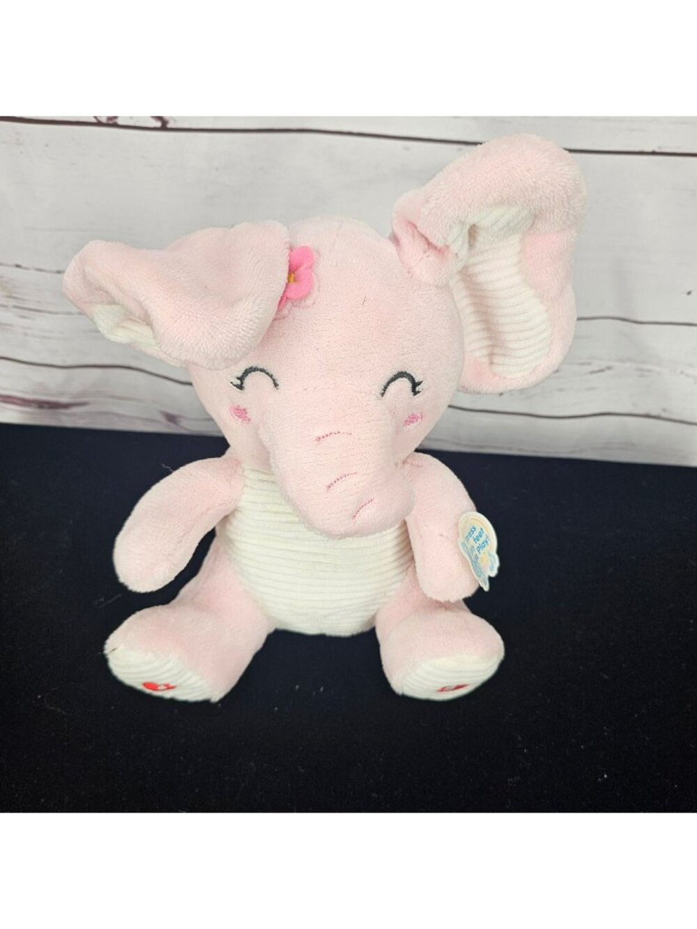 Pink Musical Elephant Plush Toy With Flower & Press-To-Play Feature - Soft & Cud